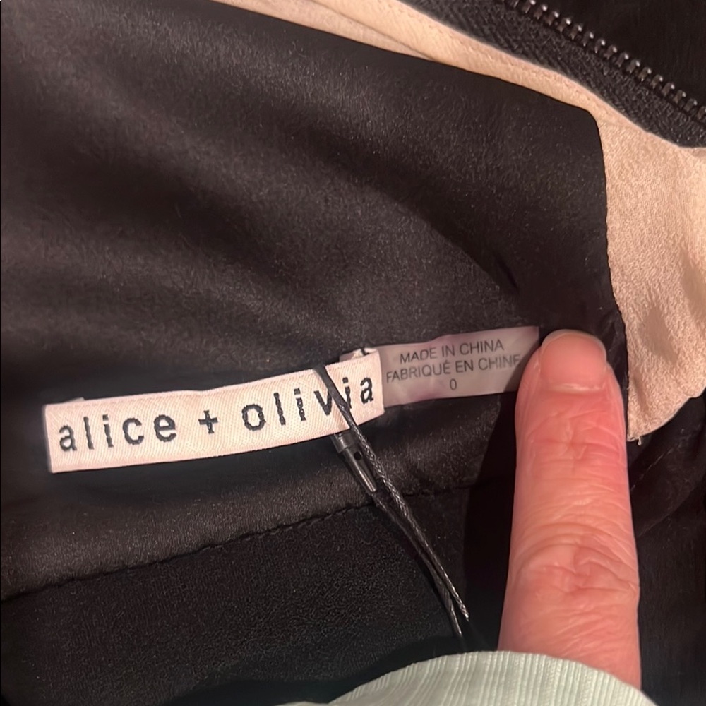 Alice + Olivia Black Wide-Leg Jumpsuit with Deep V-Neckline (FLAWED) - Picture 7 of 17